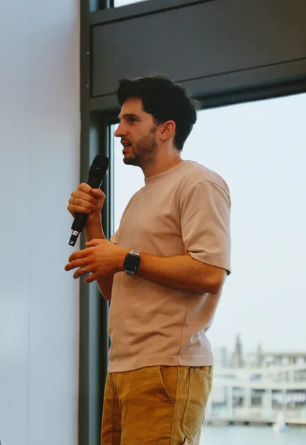 Johnny Fekete speaking at the Claude for Builders meetup in Barcelona