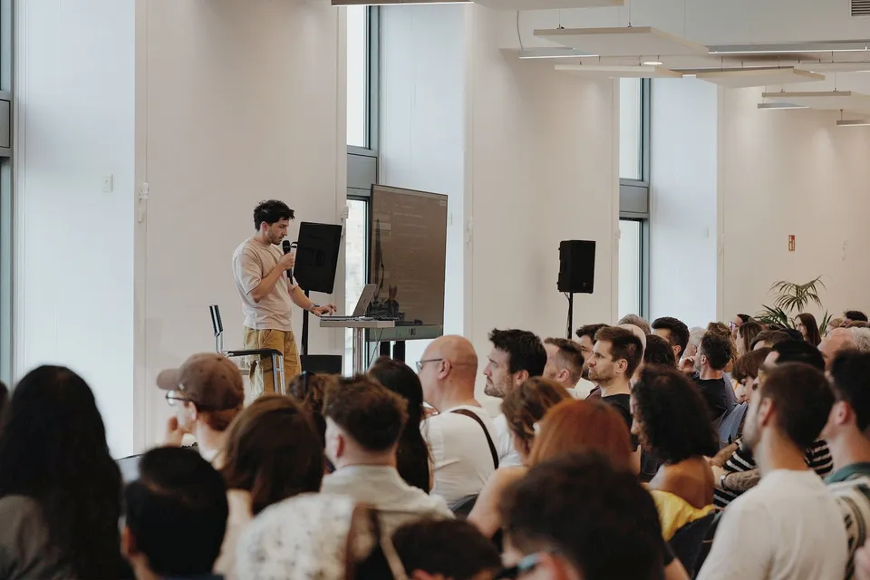 Johnny Fekete speaking at the Claude for Builders meetup in Barcelona
